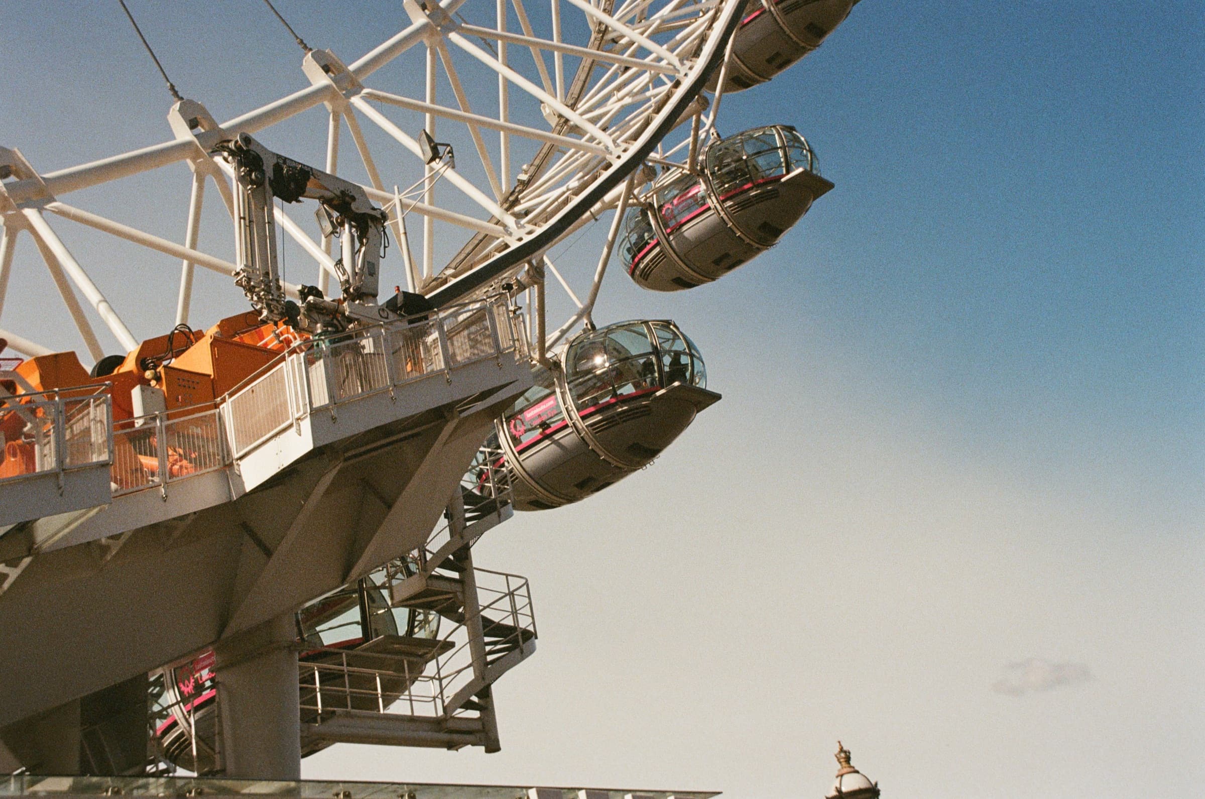 Nikon F50, Fuji 200 — the London Eye, half cloud, half sky, one long gradient.