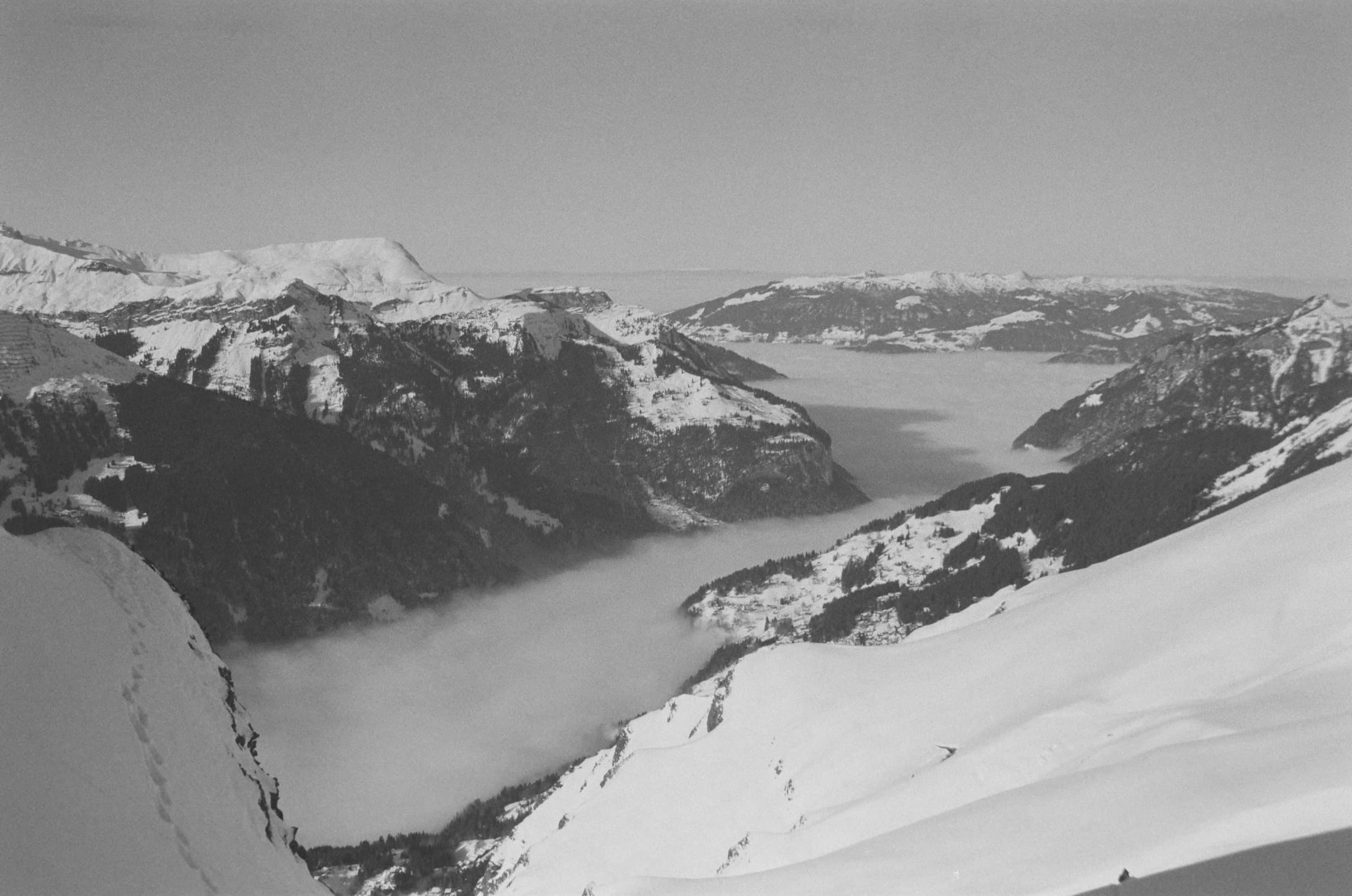 Nikon F50, Kentmere Pan 200 — the valley falling into thirds without forcing it.
